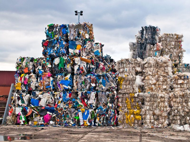 Piles,Of,Colorful,Plastic,Waste,On,A,Recycling,Site